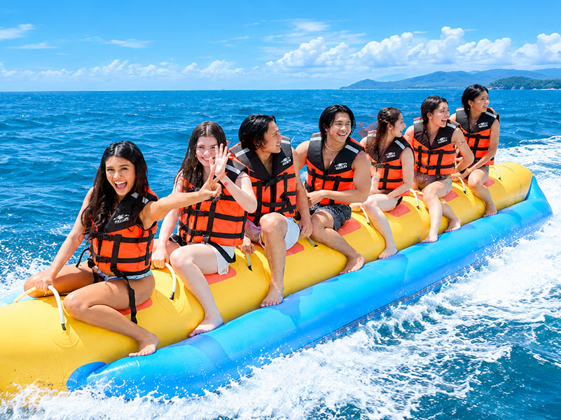 Banana boat ride towed by a watercraft